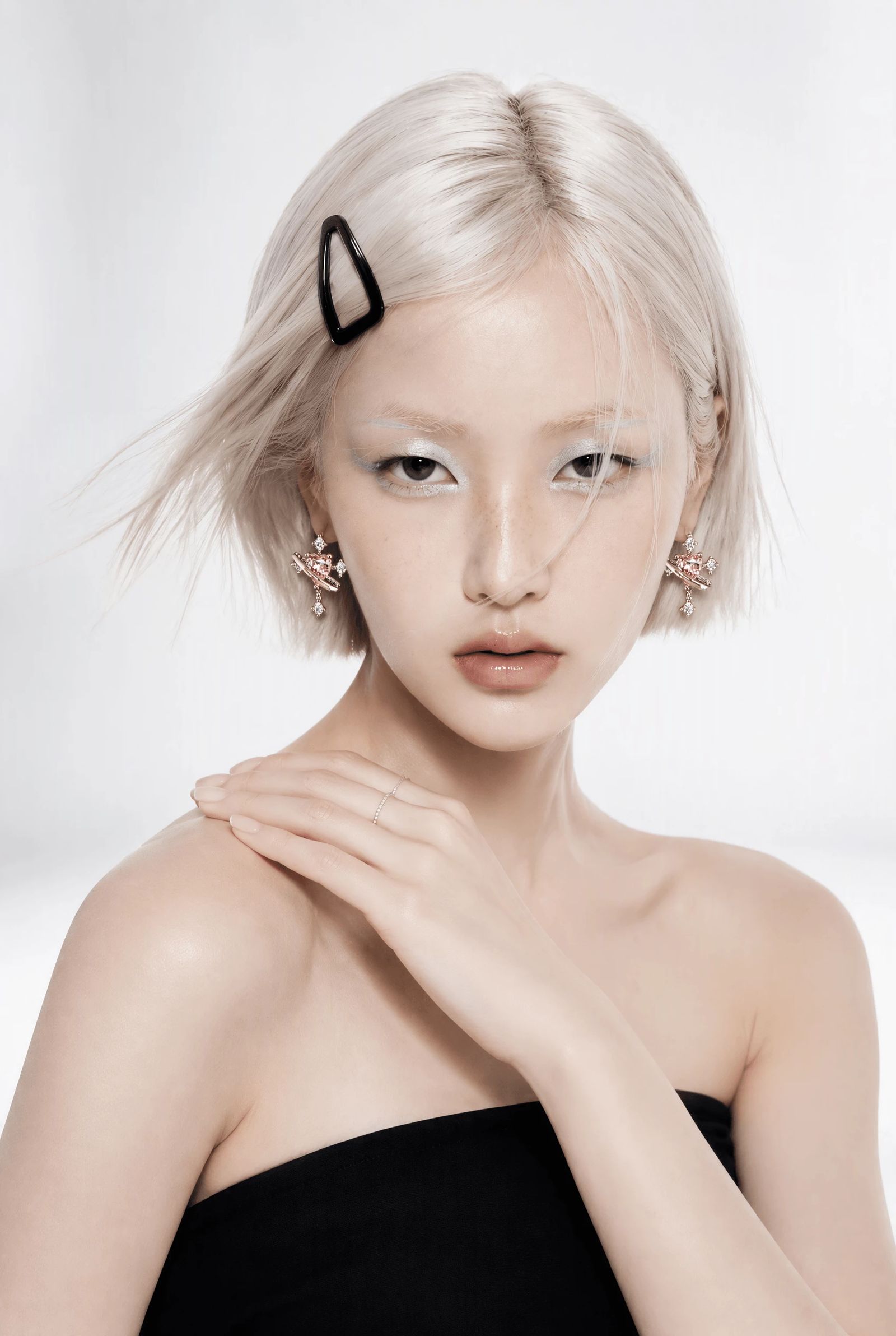 The pink heart studs on an AI-generated model, both ears visible