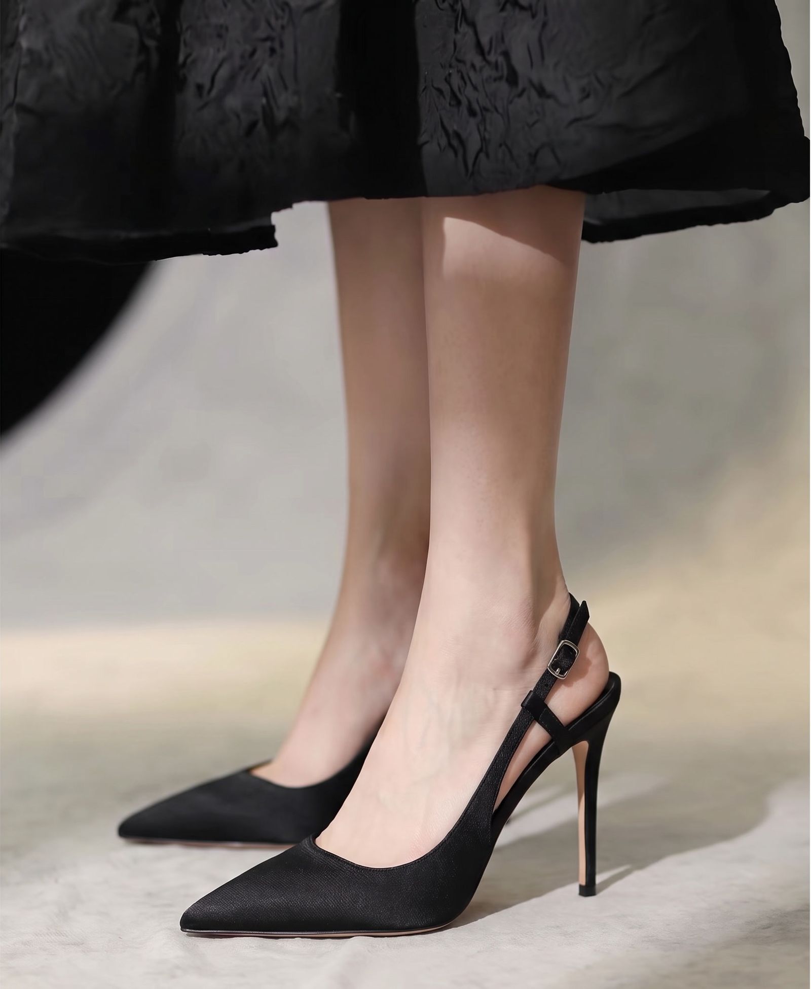 Generated close-up of a model wearing black slingback heels
