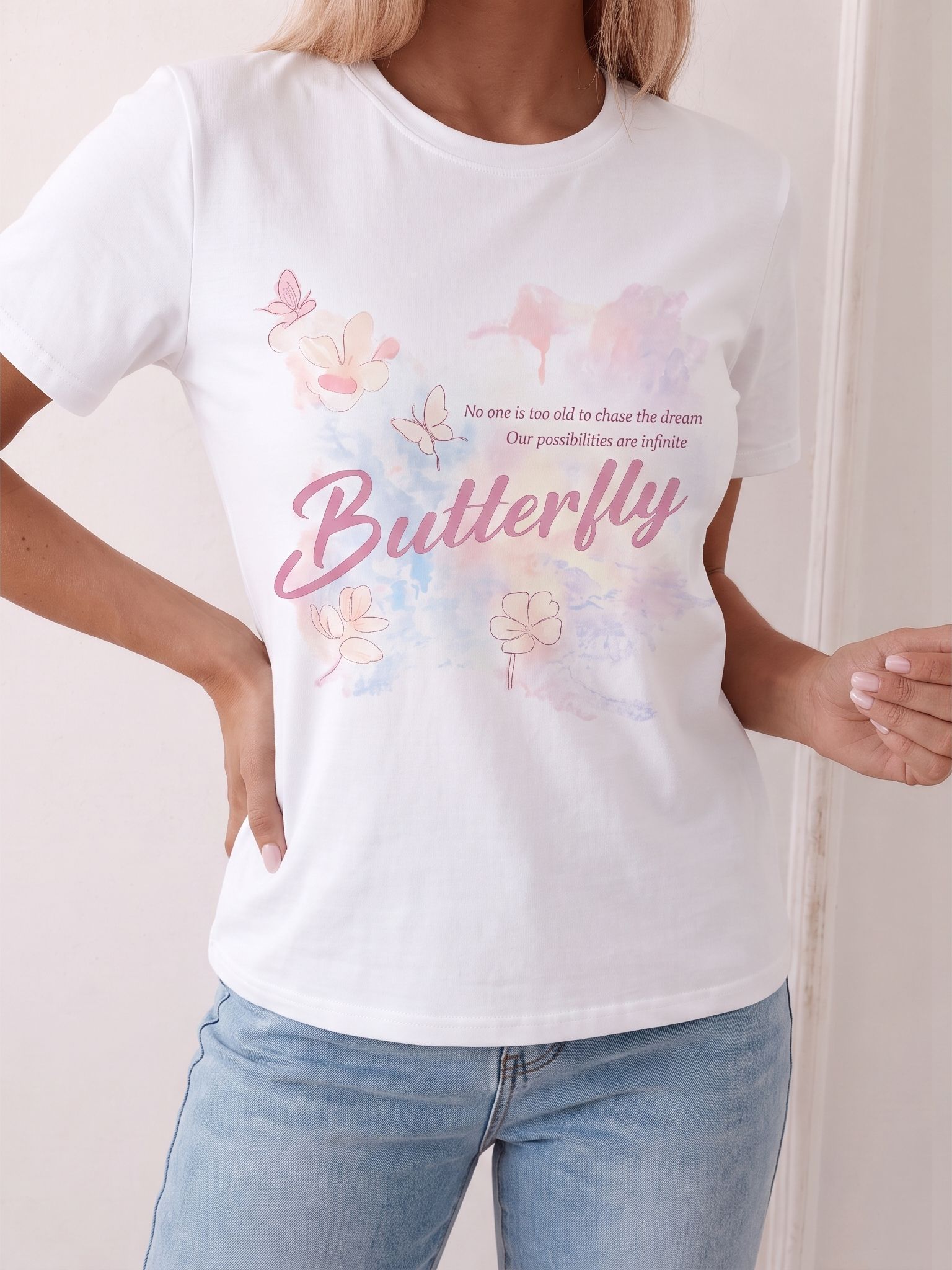 AI on-model product photo of the Butterfly T-shirt with matching wording
