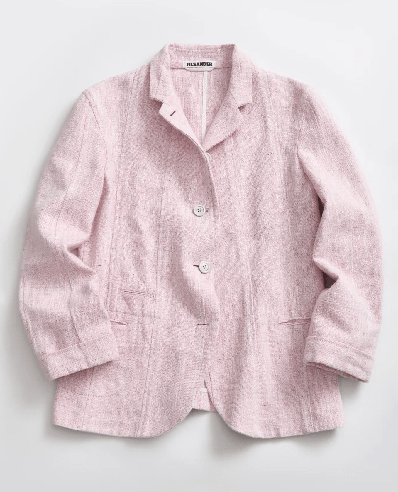Pink blazer source photo with a readable neck label