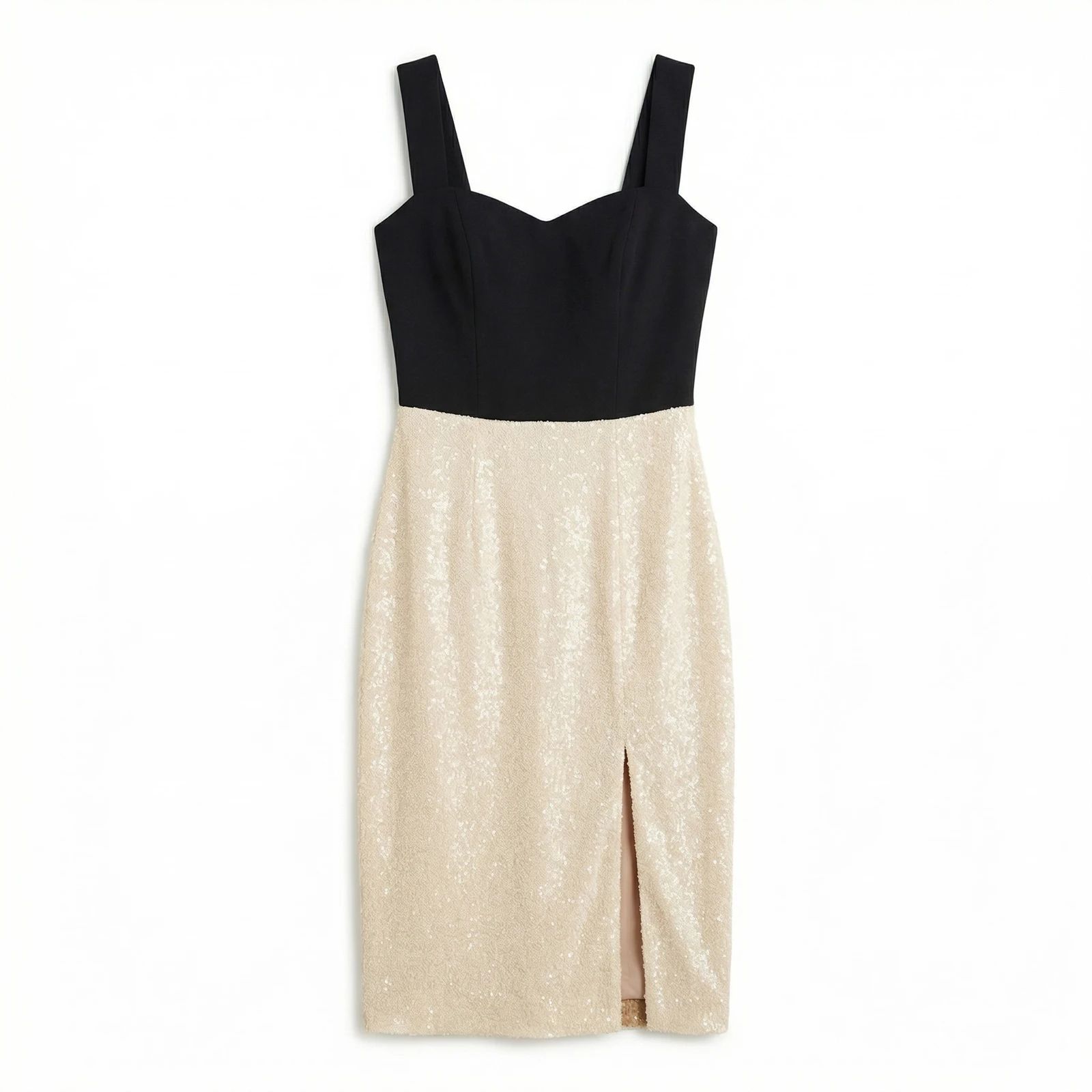 Black-and-champagne dress arranged flat against a white background