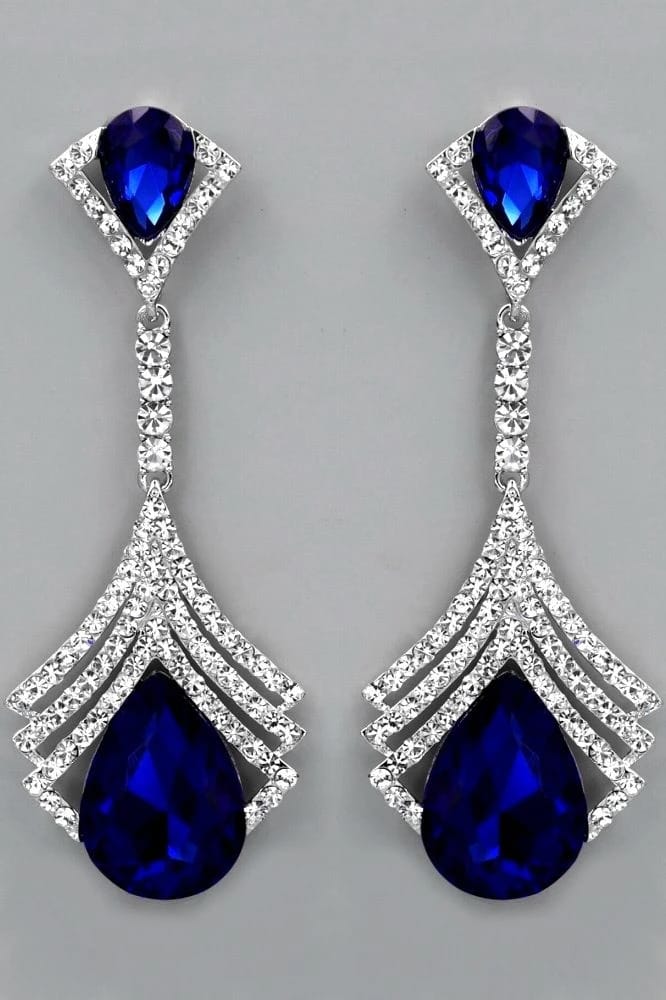 Pair of blue gemstone drop earrings displayed on a light surface