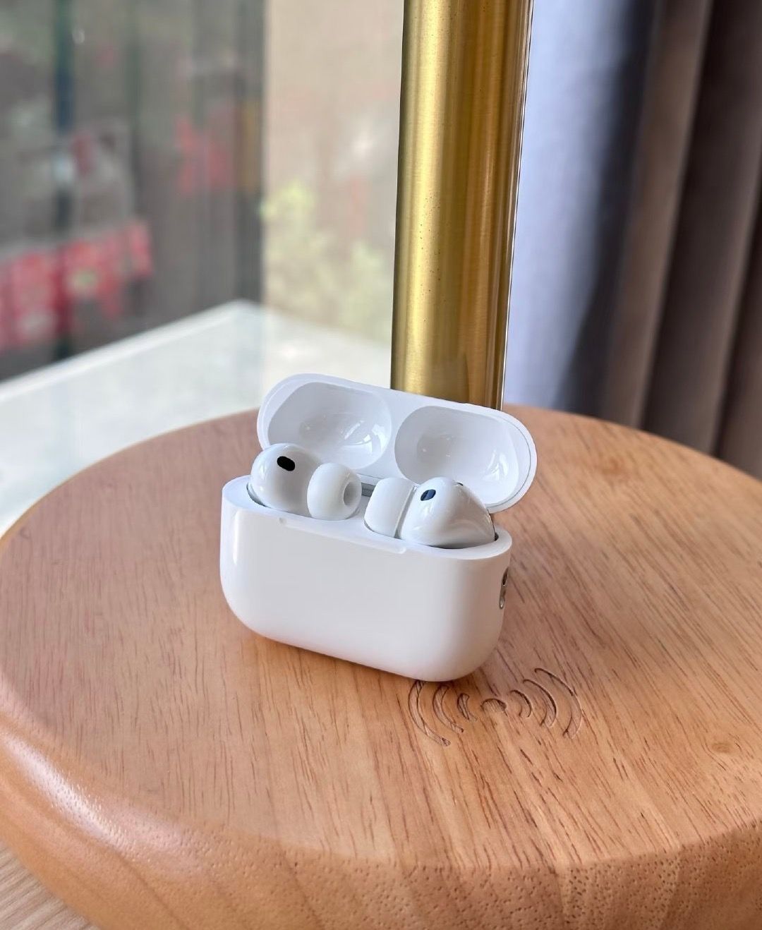 Original photo of wireless earbuds and charging case