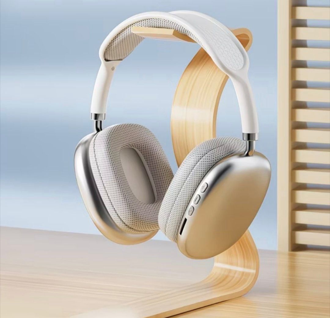 Original photo of over-ear headphones on a stand