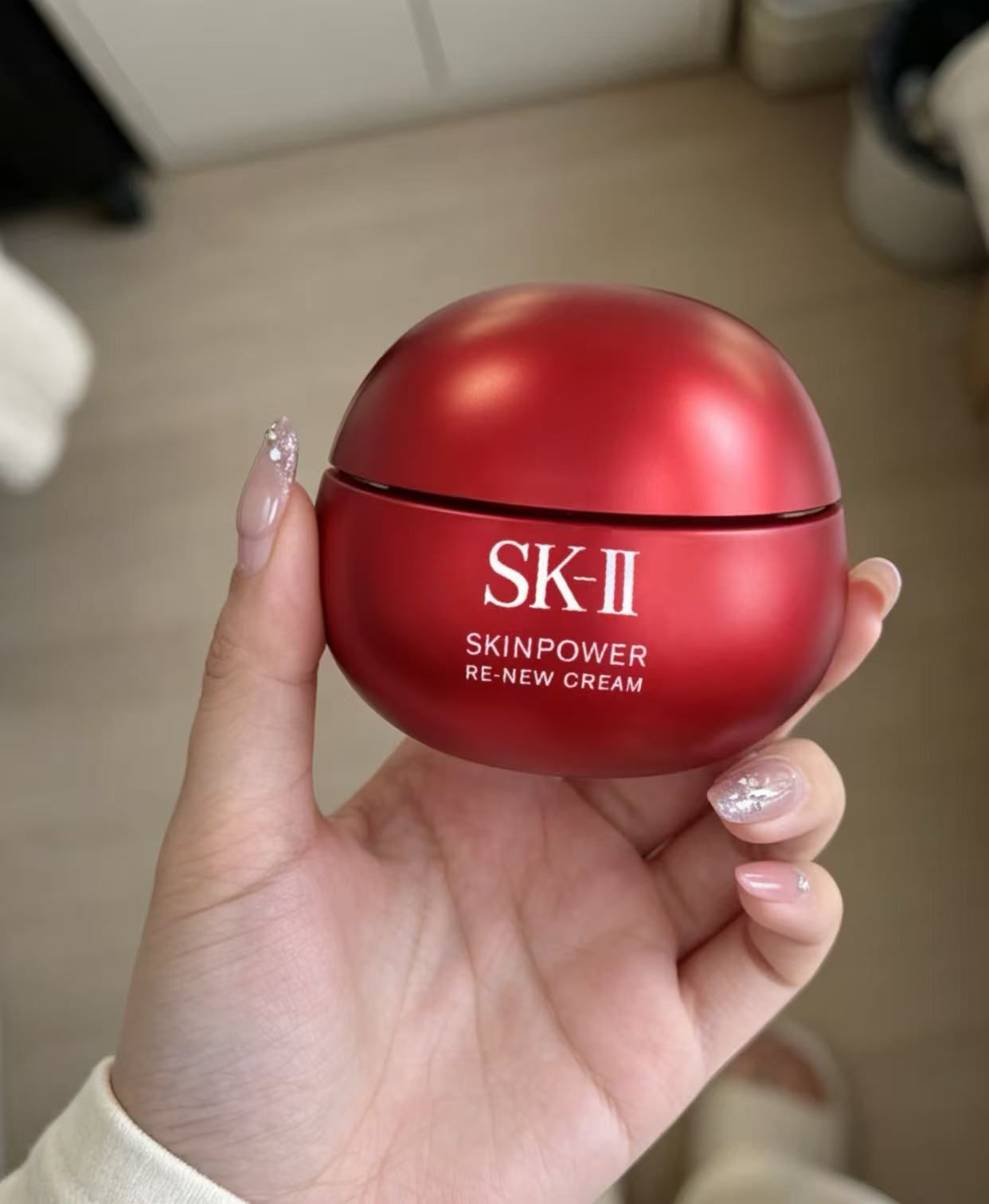Original photo of an SK-II skincare jar