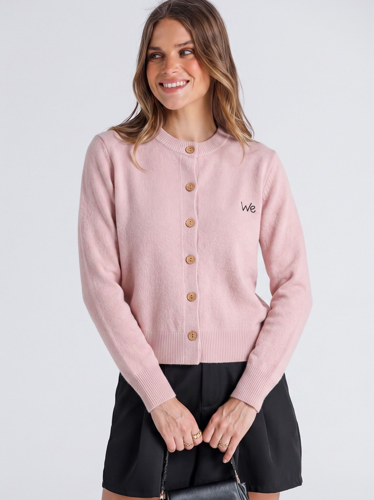 Front model view of the pink cardigan
