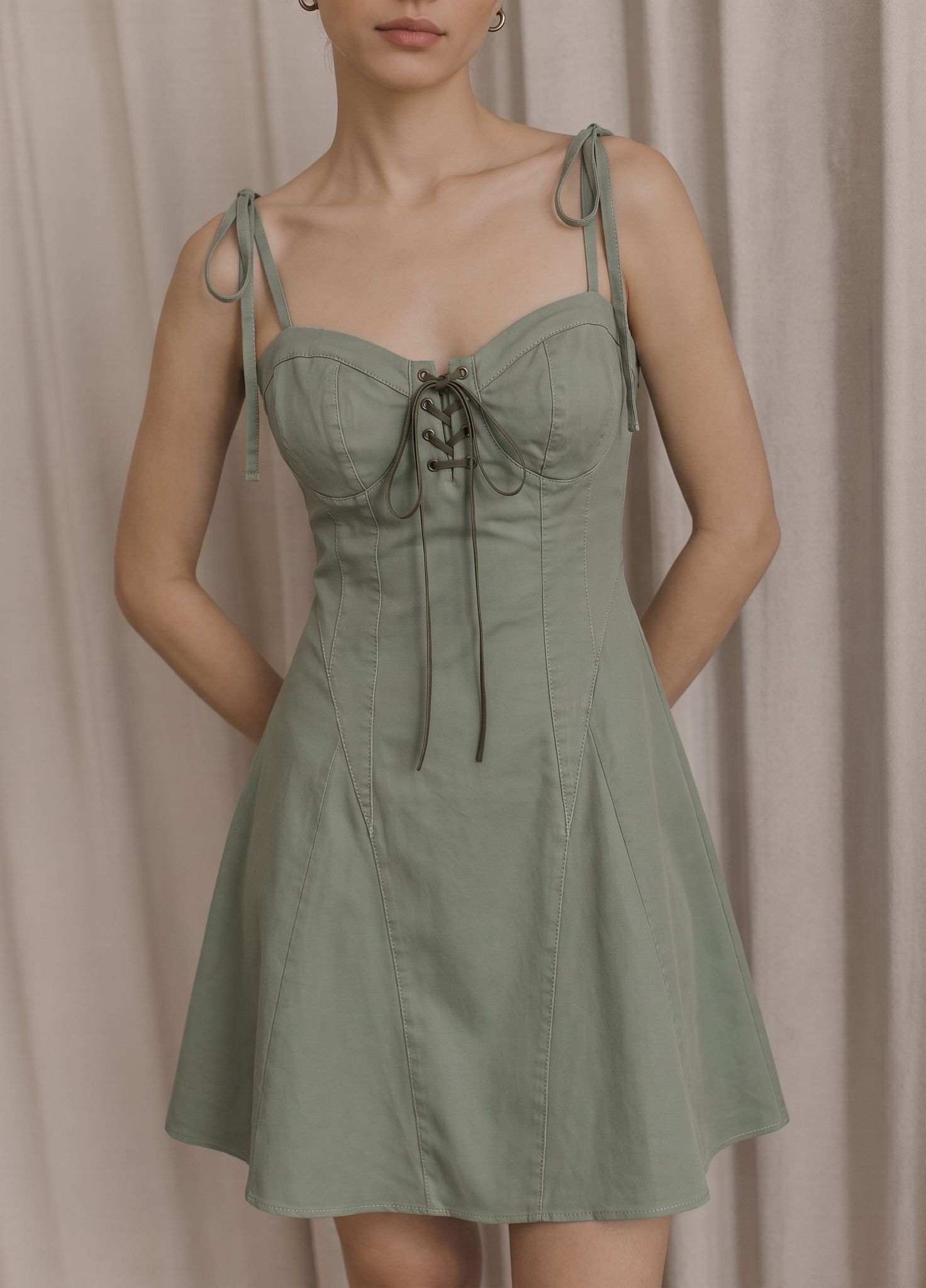 Snappyit result for the sage-green corset-style dress