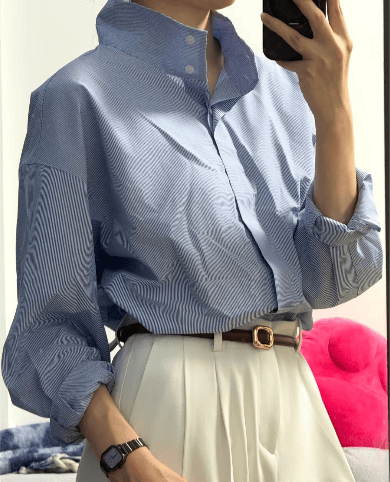 Blue shirt on a person after AirBrush wrinkle removal