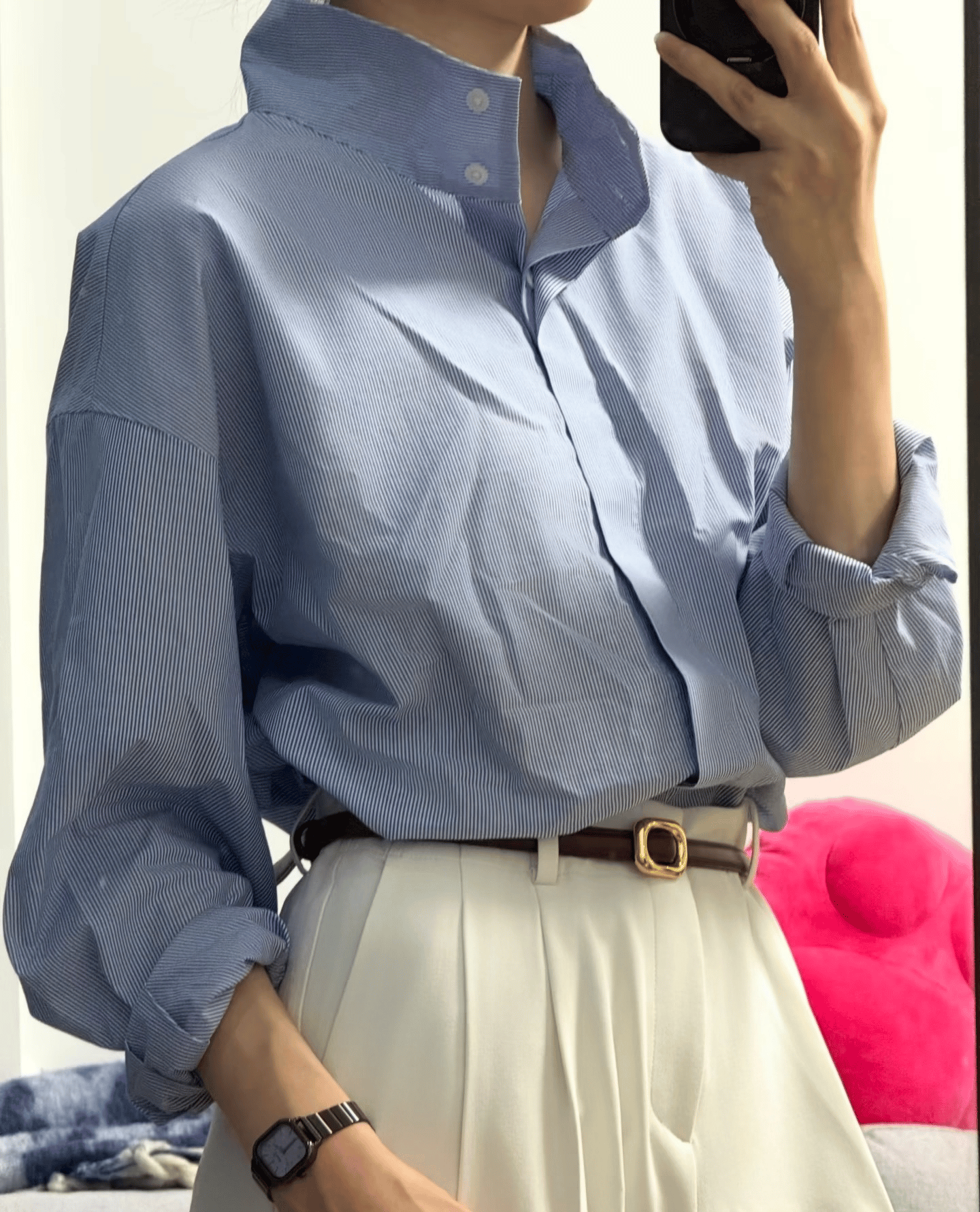 Blue shirt on a person after PicWish wrinkle removal