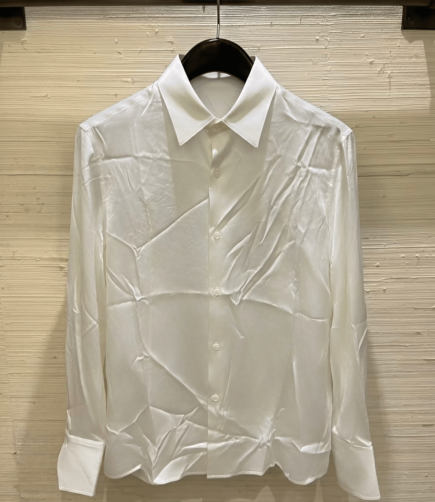 White shirt with deep folds after PicWish wrinkle removal
