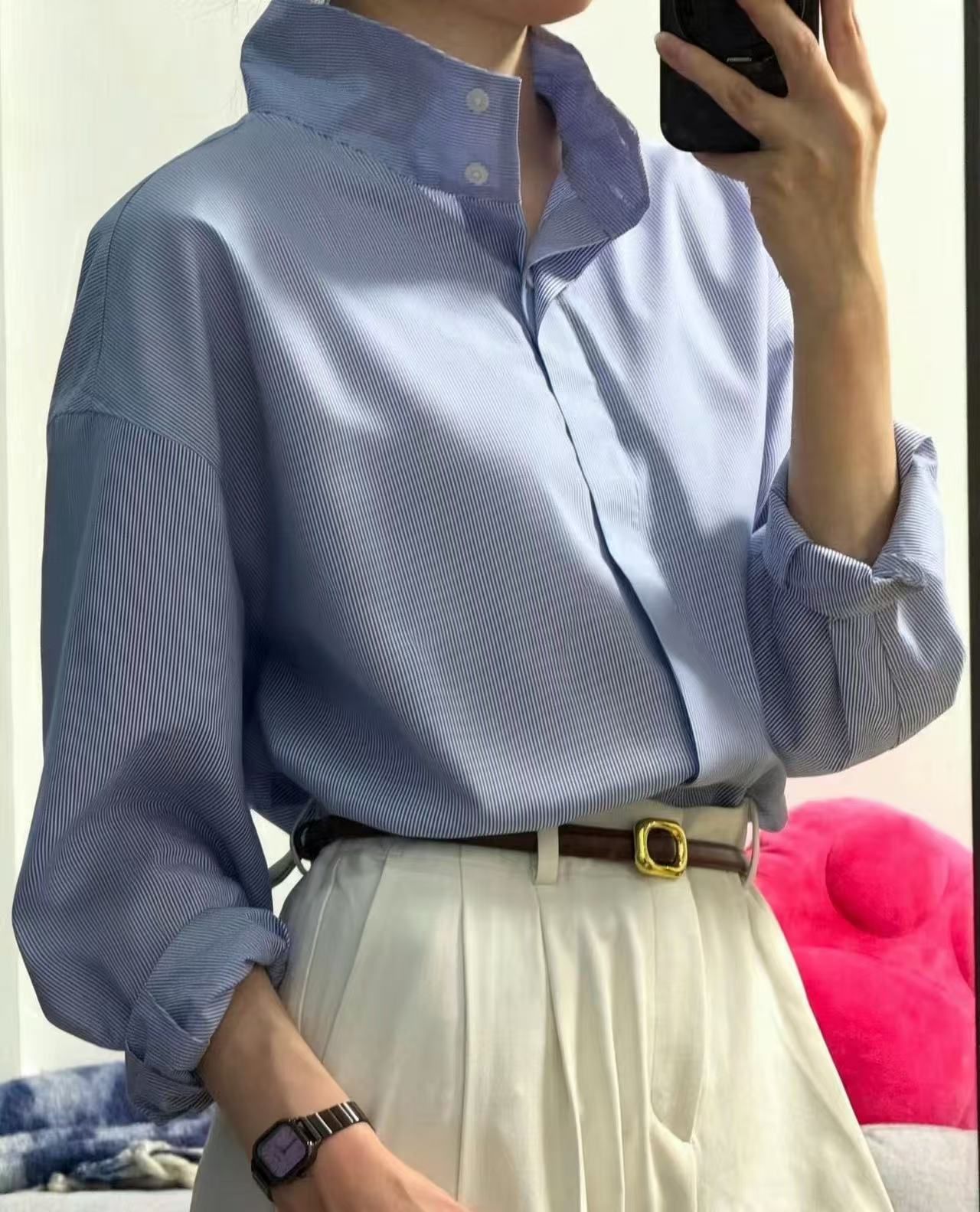 Blue shirt on a person after Snappyit wrinkle removal