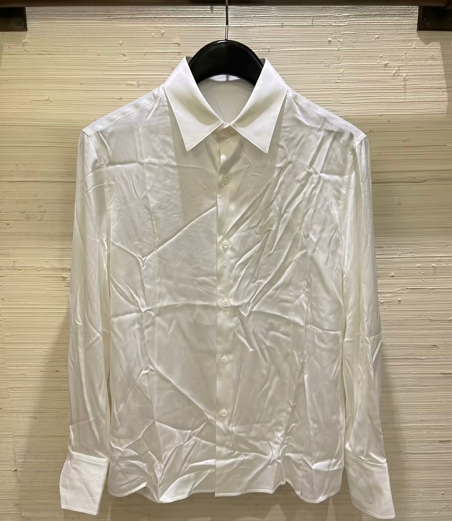 White shirt with deep wrinkles before processing