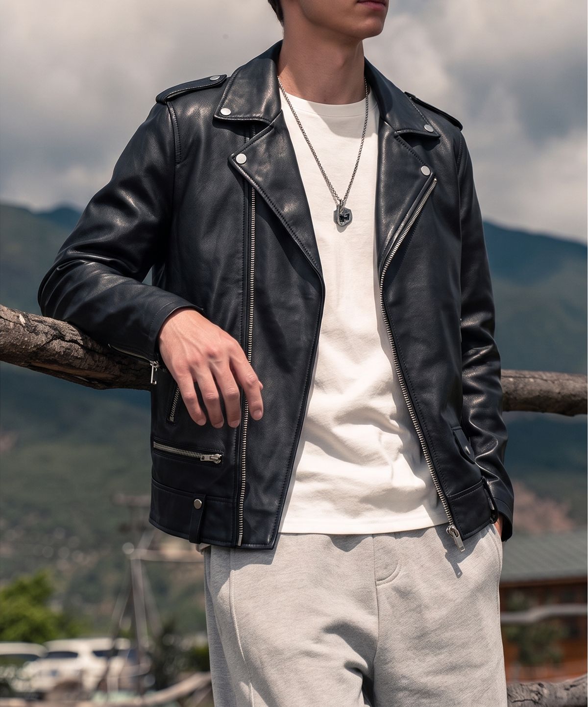 Black leather jacket styled on a model outdoors