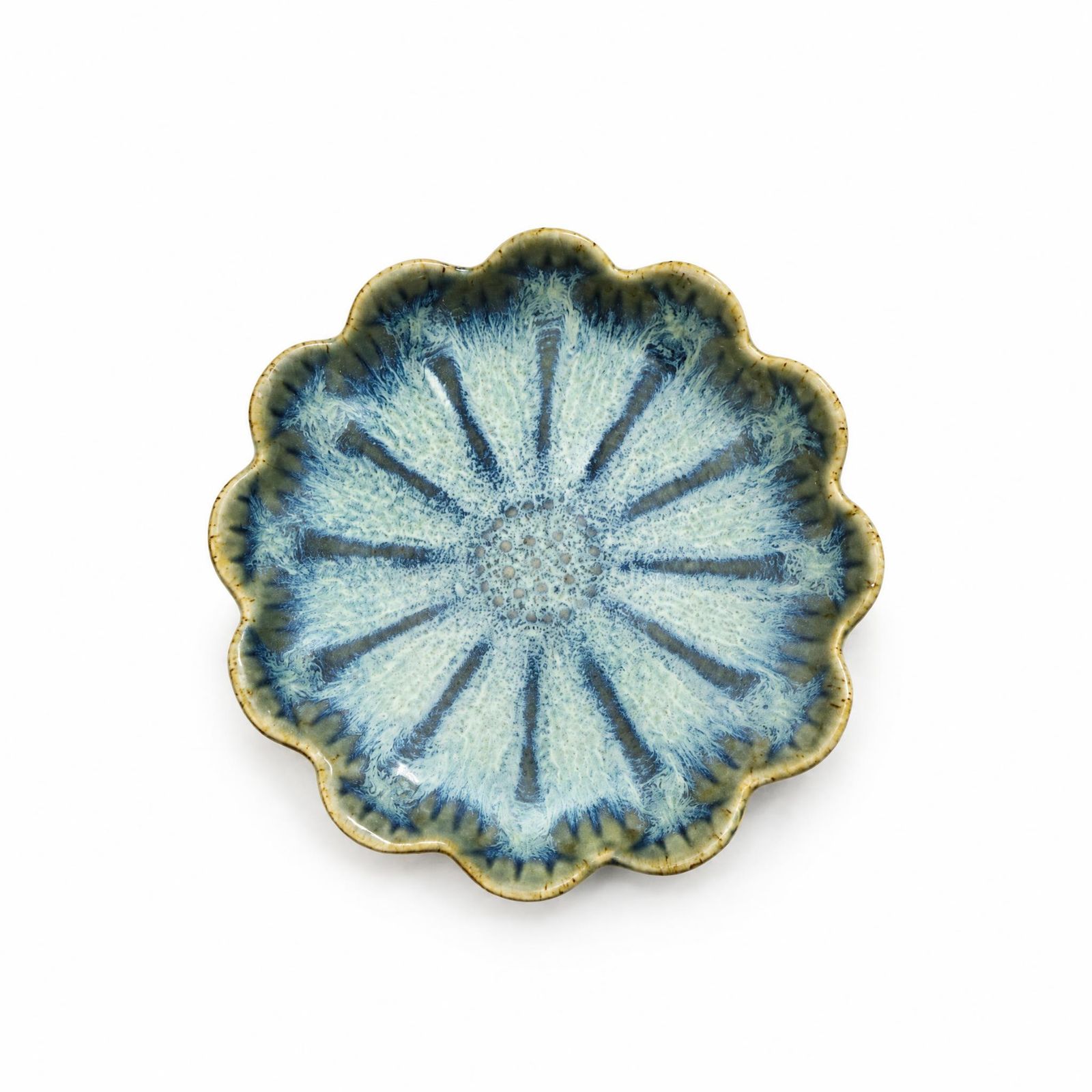 Blue-green ceramic plate presented on a white background