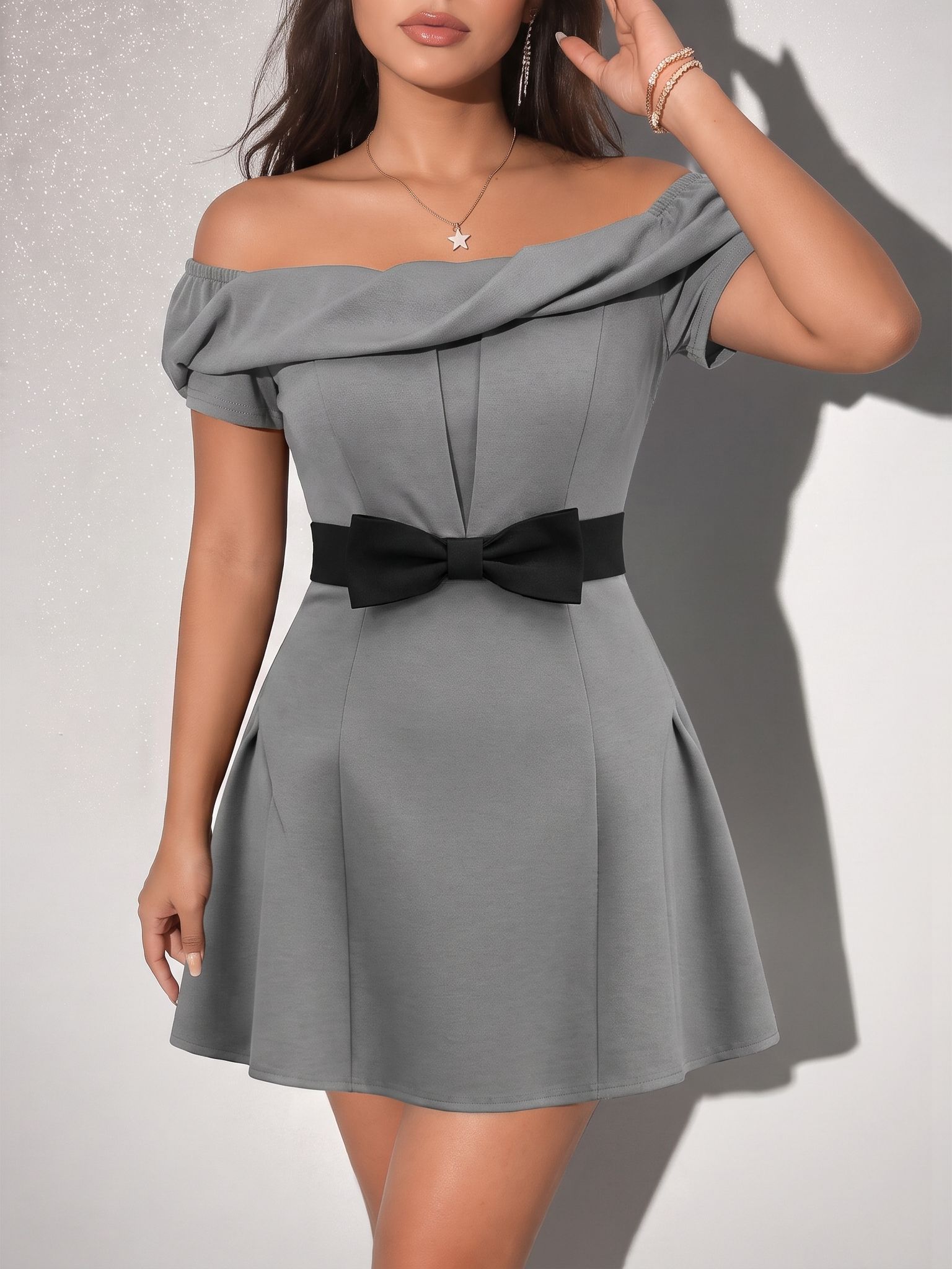 AI-generated mid-size model wearing the gray dress against a gray background with one arm raised