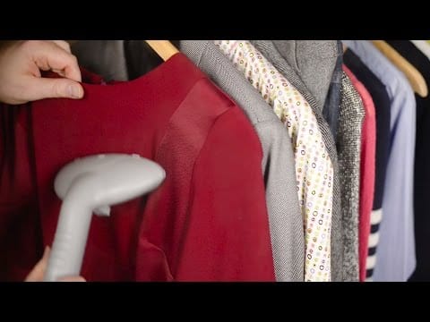 Garment steamer being used on clothing before a photo shoot