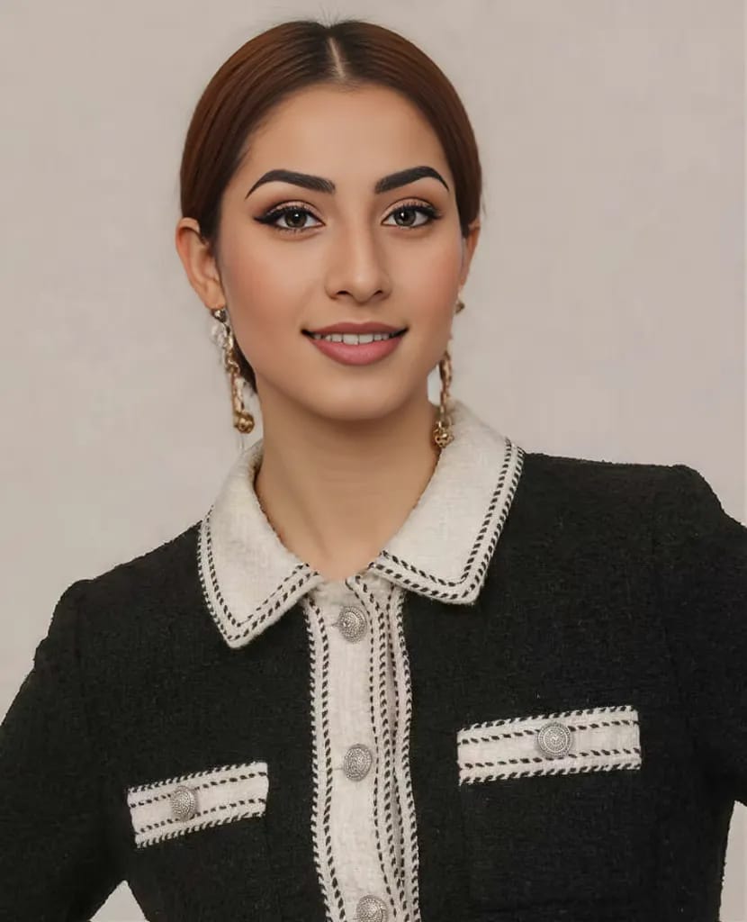 OnModel.ai output for the same source photo: the preset model Maya rendered front-facing in the black tweed jacket, with the original drop earrings replaced and the pose changed from the source.
