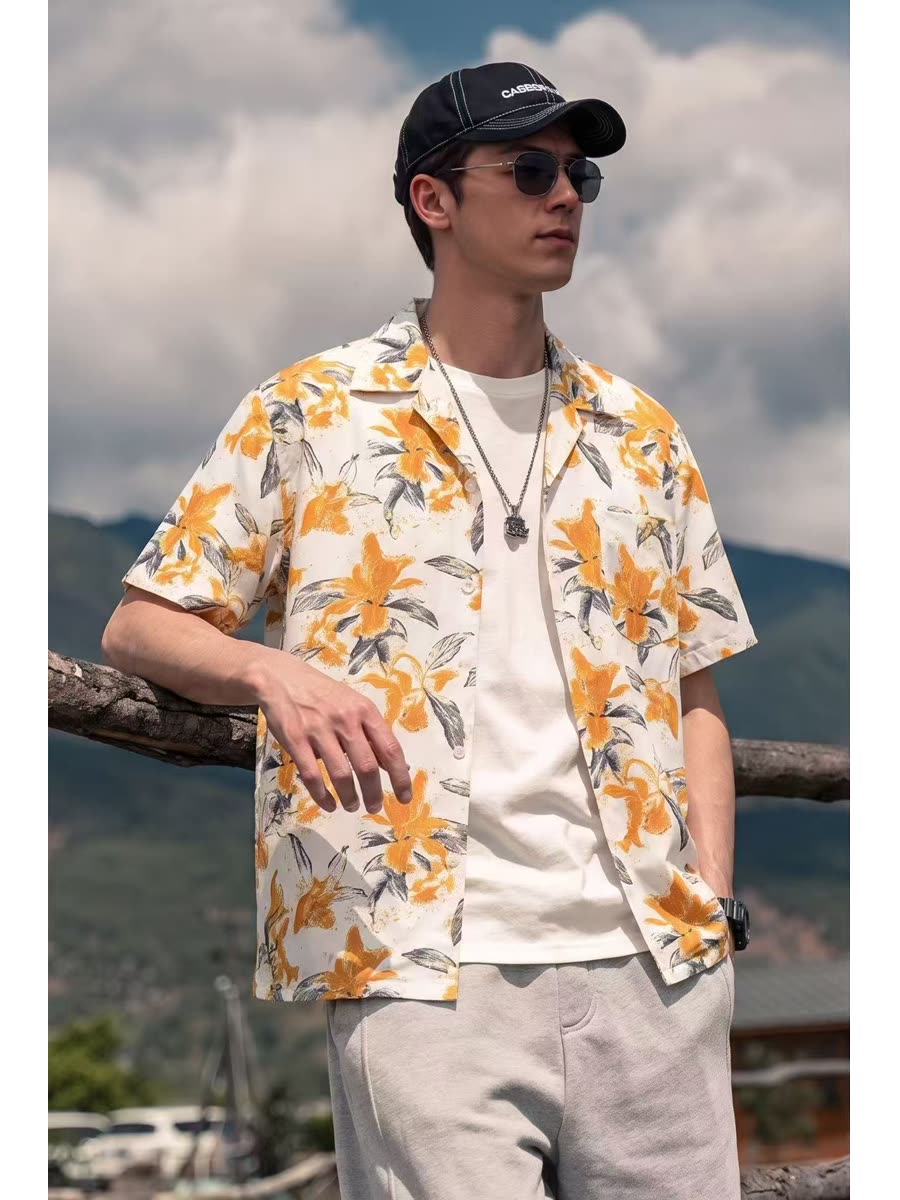 Snappyit result &mdash; the same shirt worn open over a white tee against a wooden rail