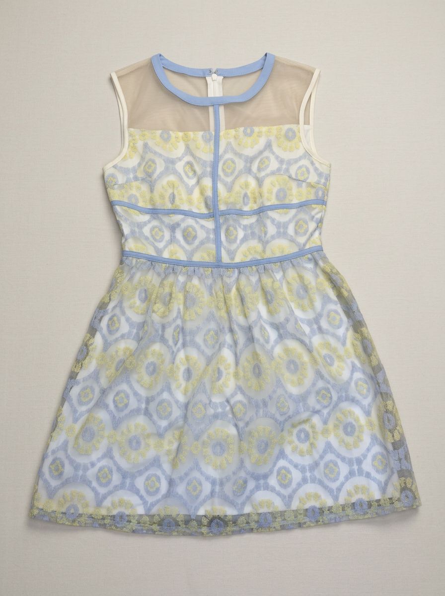 Pixelcut flat-lay result for the embroidered dress on a neutral studio background