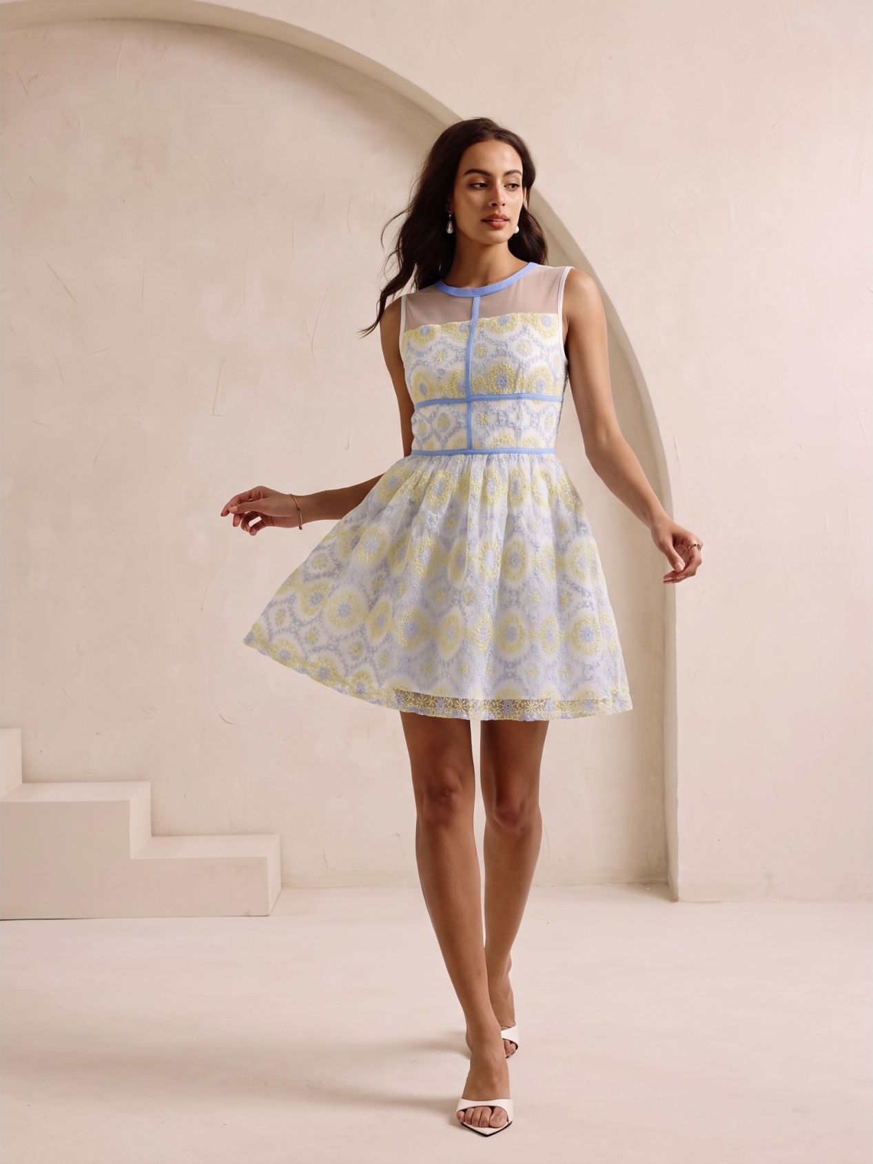 Snappyit on-model result with the custom model wearing the embroidered blue and yellow dress