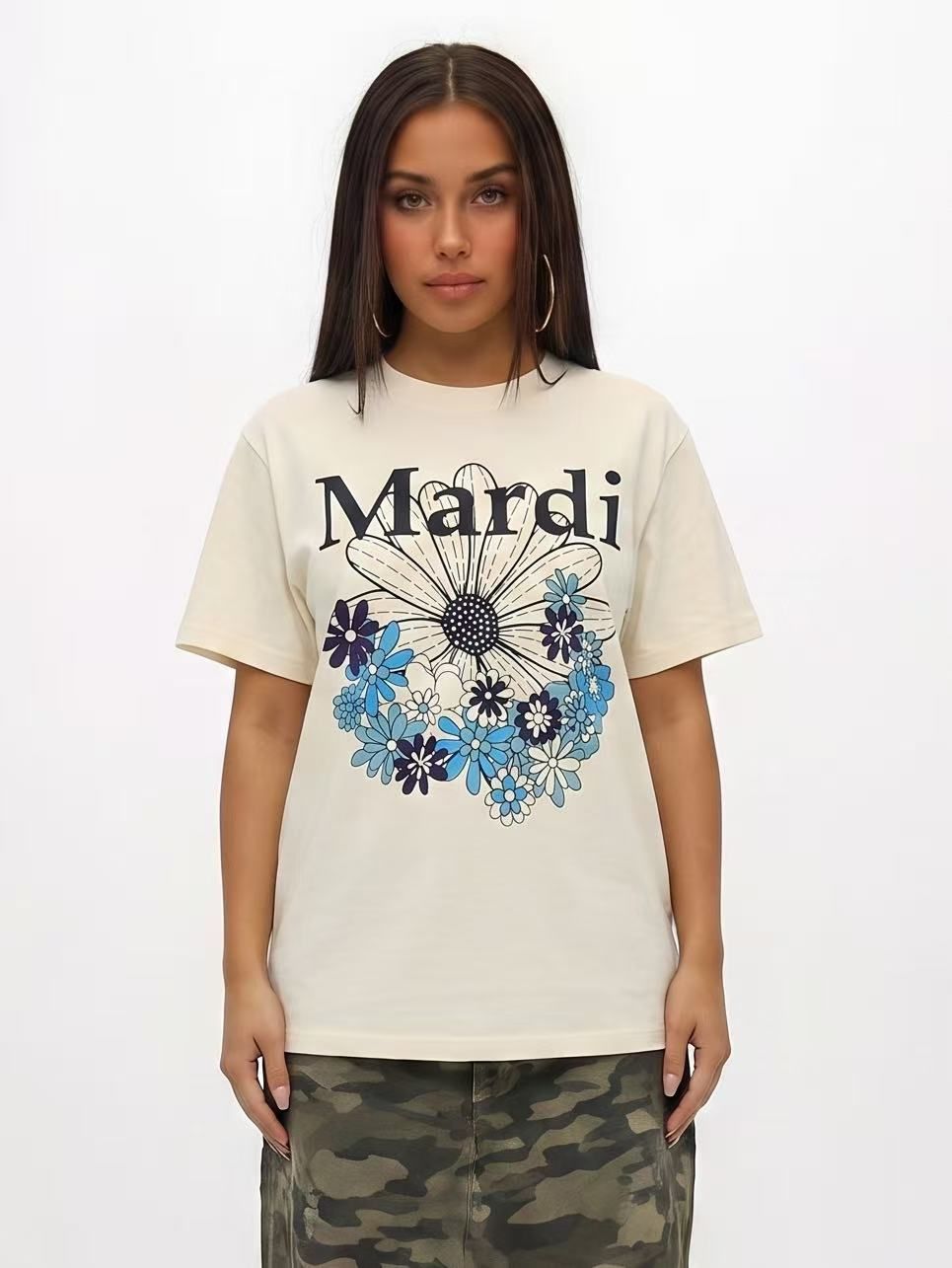 Snappyit try-on result &mdash; the same Mardi floral tee worn oversized on a plain white studio background, drop shoulders and long hem intact, with the print filling the centre of the frame