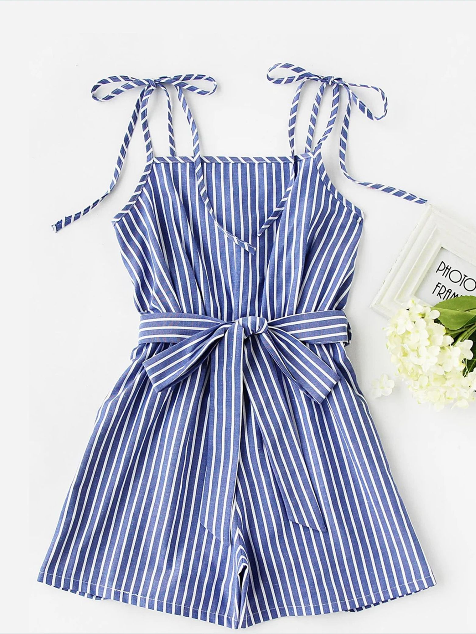 Striped romper flat lay source photo