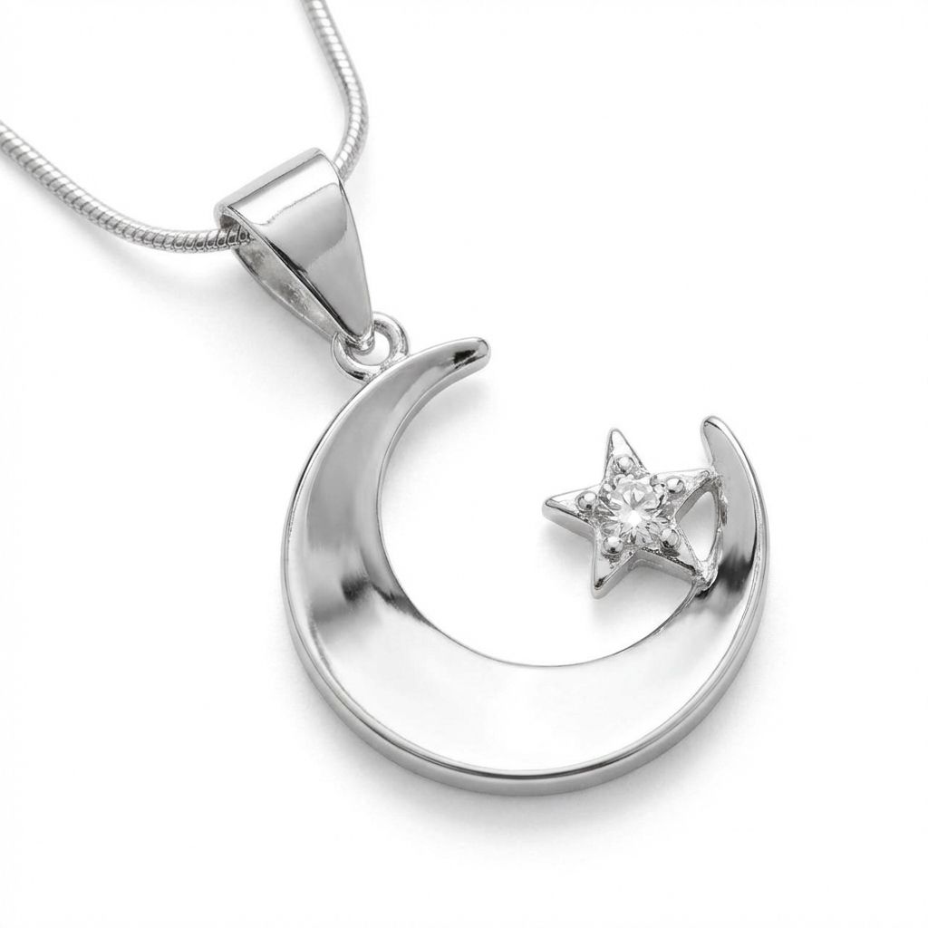 Silver moon-and-star pendant before jewelry metal recoloring