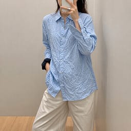 Try AI wrinkle removal on a blue button-up shirt