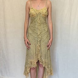 Try AI wrinkle removal on a green lace-trim dress