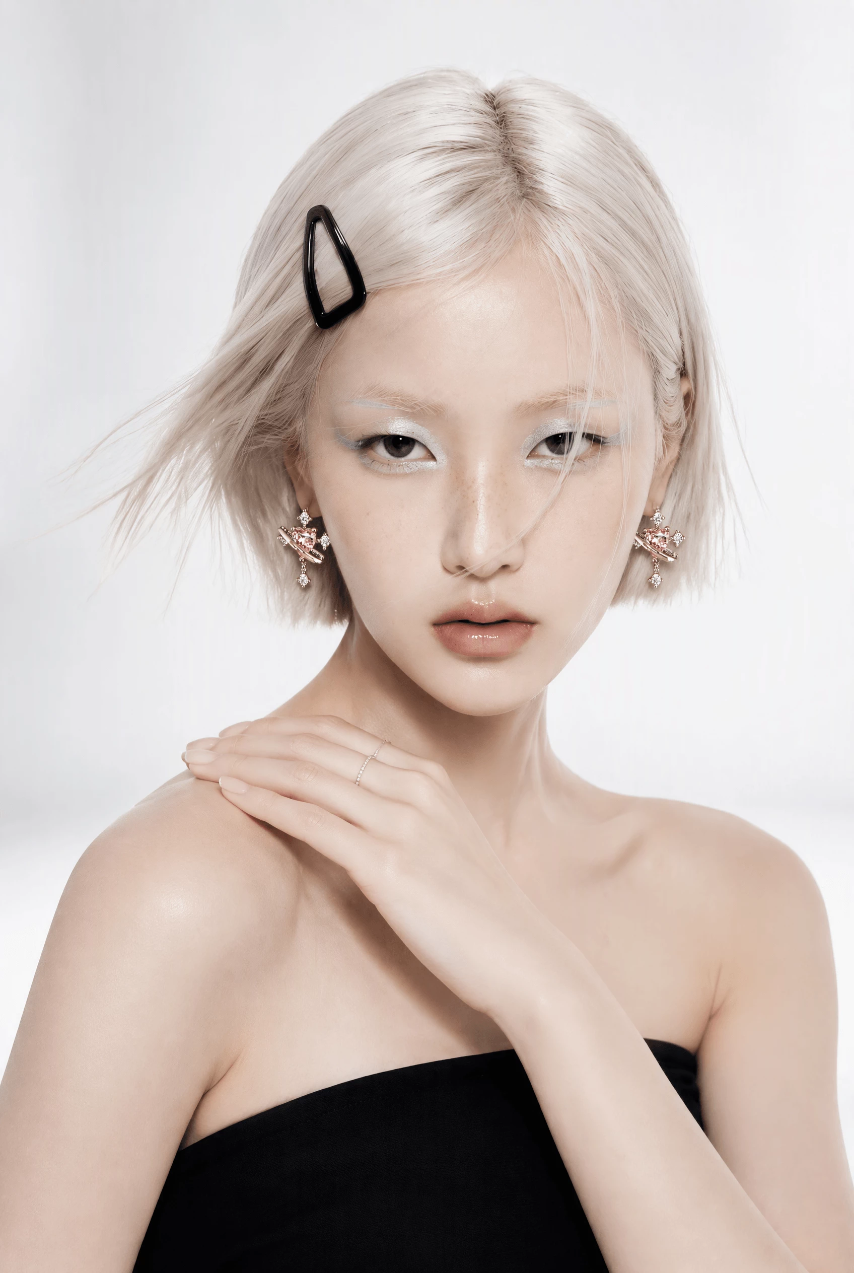 The pink heart studs on an AI-generated model, both ears visible