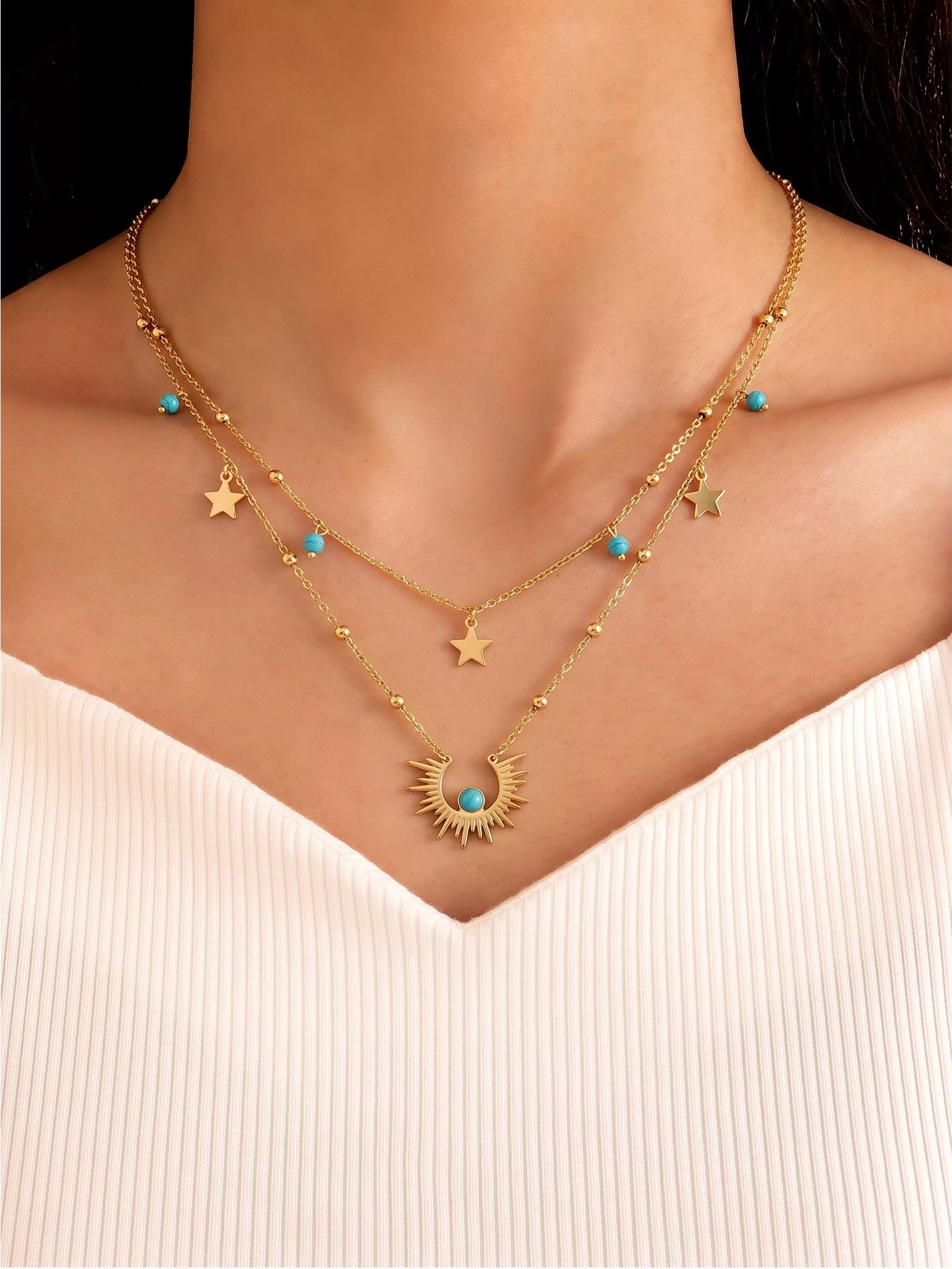 Snappyit Jewelry Model output — layered turquoise and gold necklace worn on a model's neck at correct length, both chains draping naturally over the collarbone