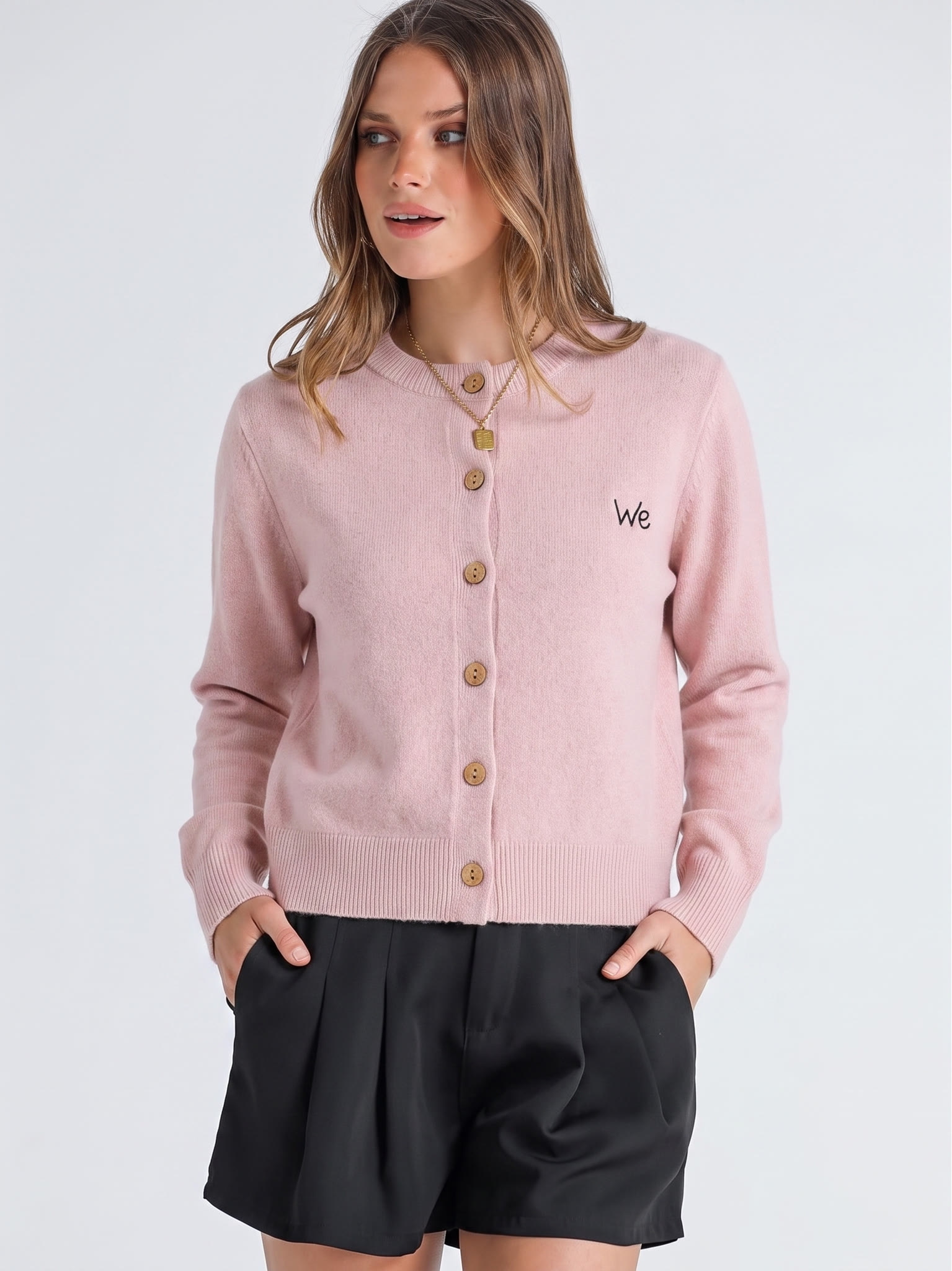 Alternate front model view of the pink cardigan