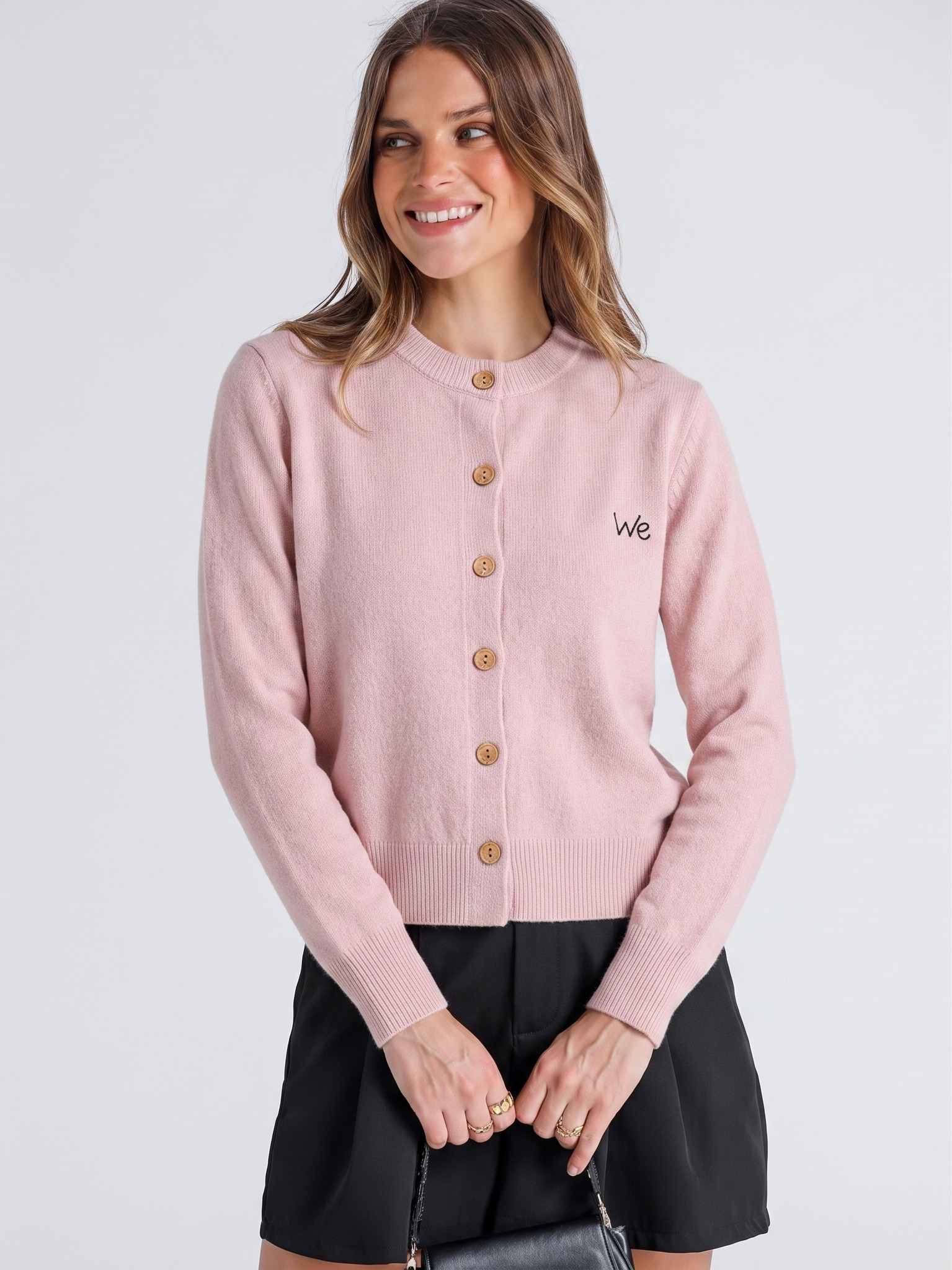 Front model view of the pink cardigan