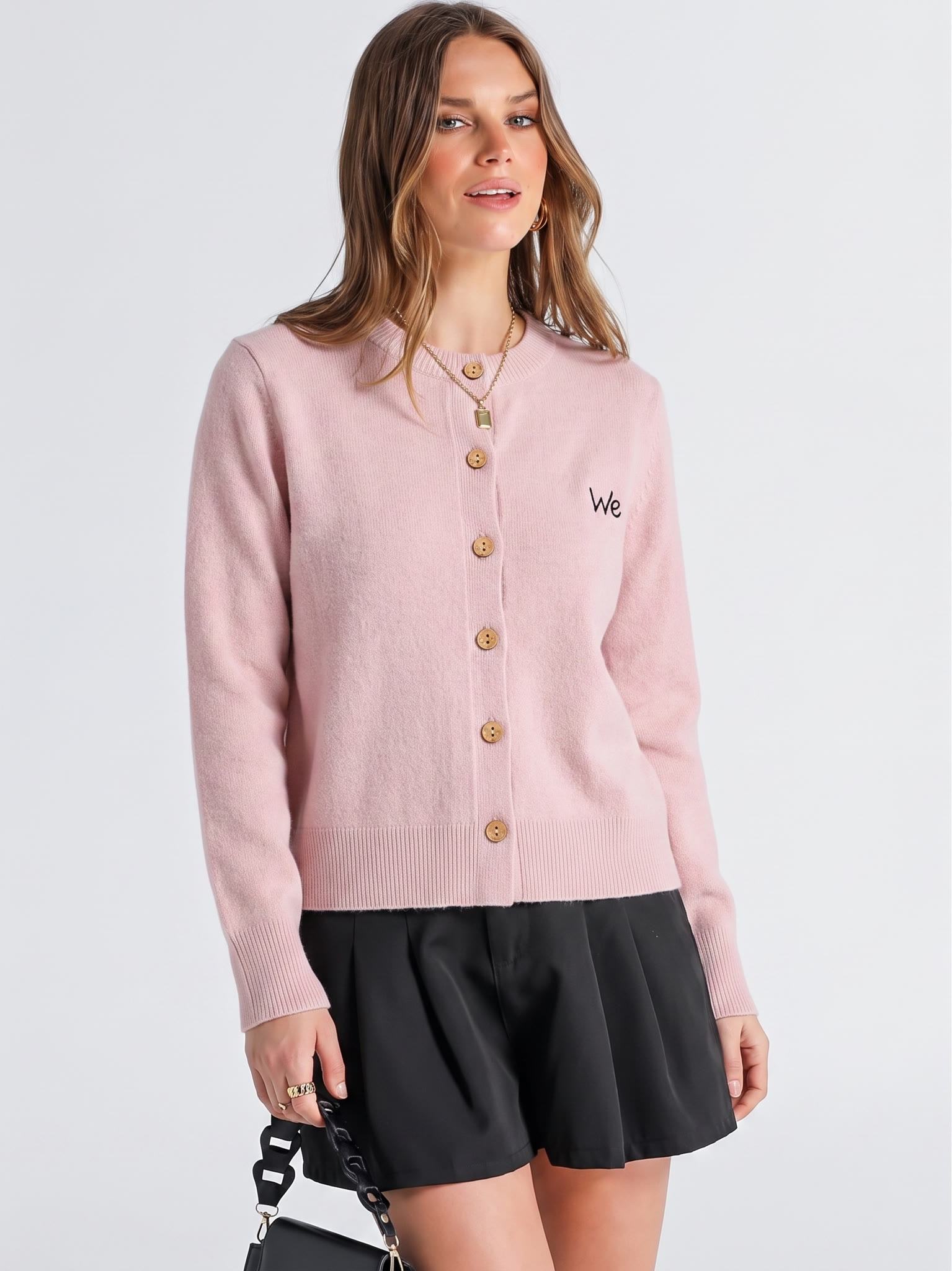 Second styled front model view of the pink cardigan