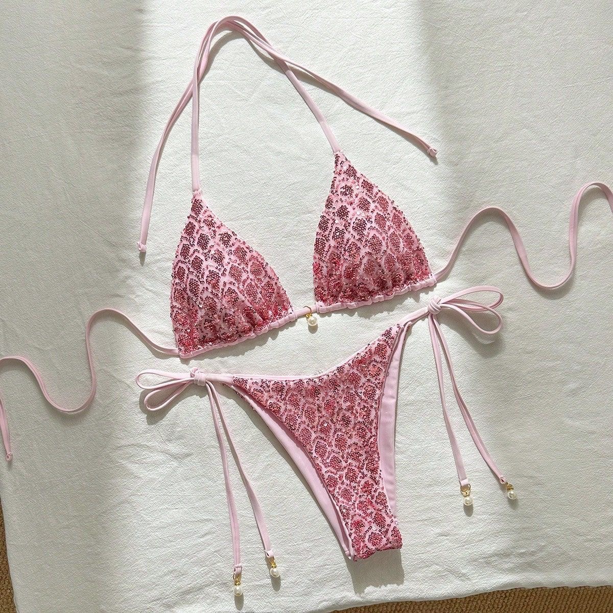 Sequined bikini top flat-lay, the source photo given to every tool in this test