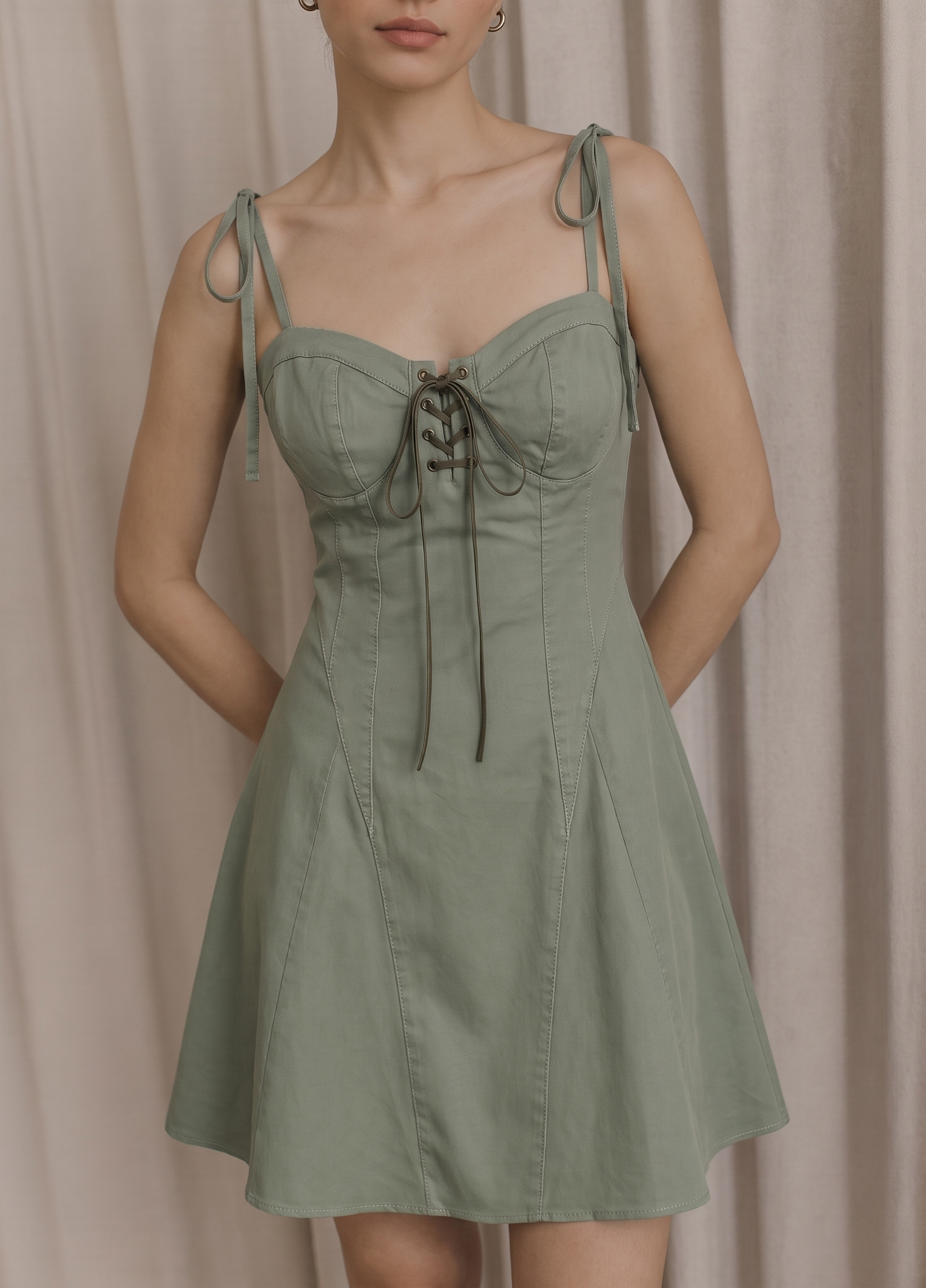 Snappyit result for the sage-green corset-style dress