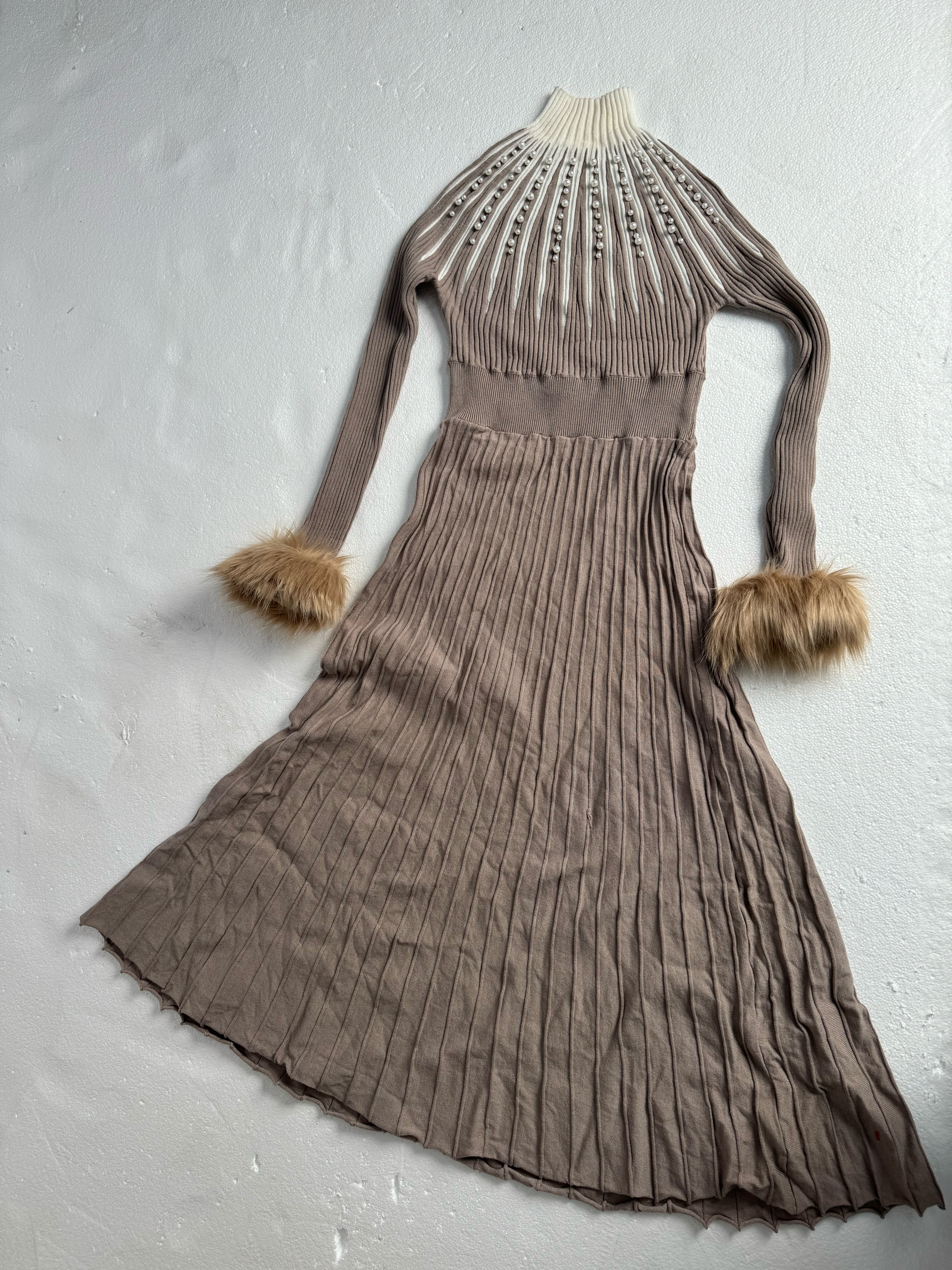 Knit fur-cuff dress phone source photo flat on a wall — typical reseller starting input