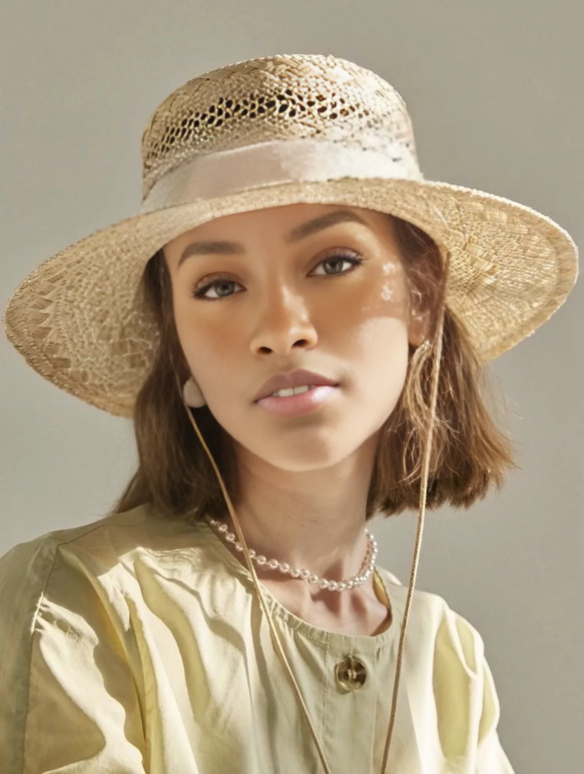 remaker ai face swap result from the deep skin source face showing the skin tone pulled toward the original photo