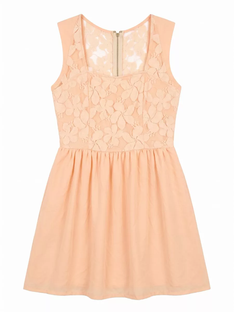 Peach lace dress on a white background after AI flat lay generation