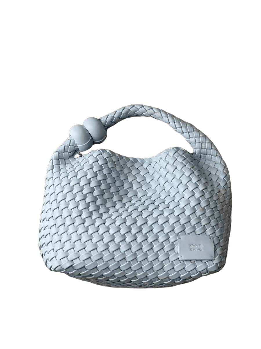 The woven handbag cut out by Erase.bg at the full 1200 by 1600 of the original