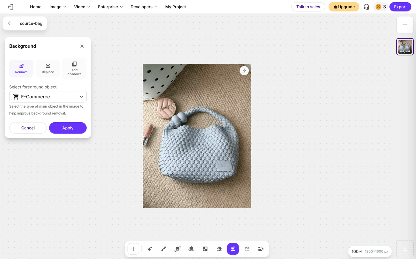 The Erase.bg workspace inside the Pixelbin editor, with the Background panel open, the Select foreground object dropdown set to E-Commerce, and a credit counter reading 3 in the top right