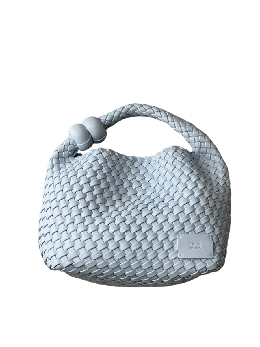 The woven handbag cut out by PhotoRoom at the full 1200 by 1600 of the original