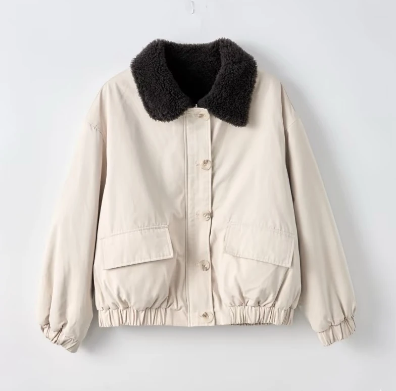 Original photo of a cream padded jacket with a dark fleece collar