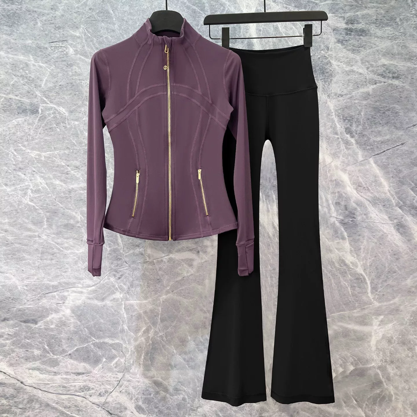 Original seller photo of a purple jacket and black flared pants