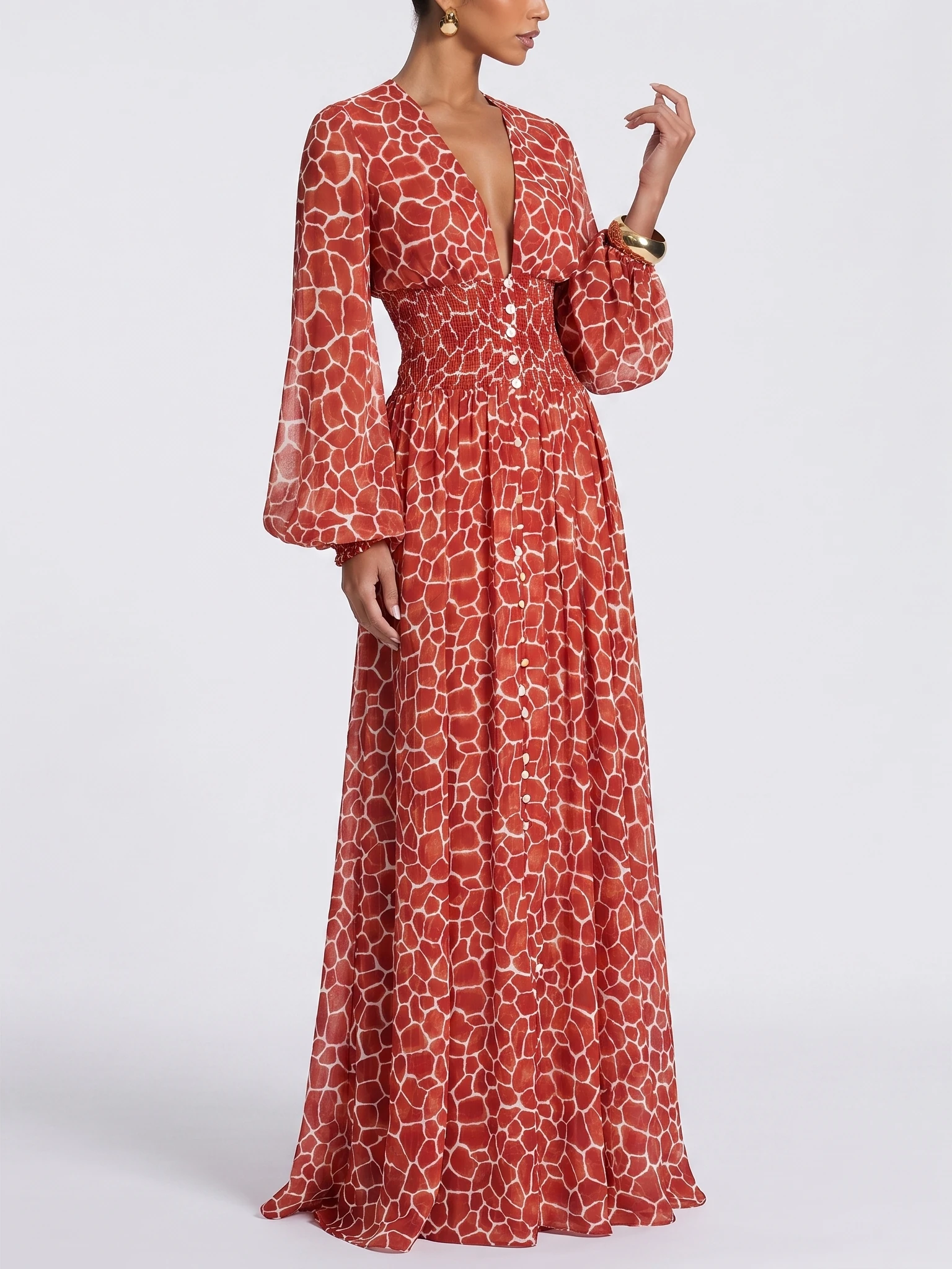Closer angled model composition showing the red dress neckline, sleeve and gathered waist