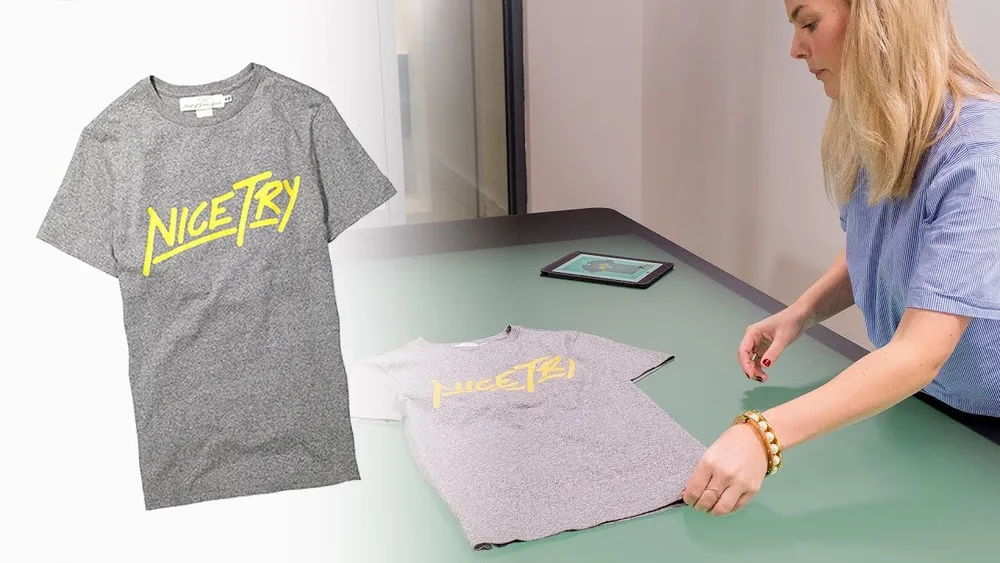 Studio demonstration of photographing a T-shirt as a flat lay