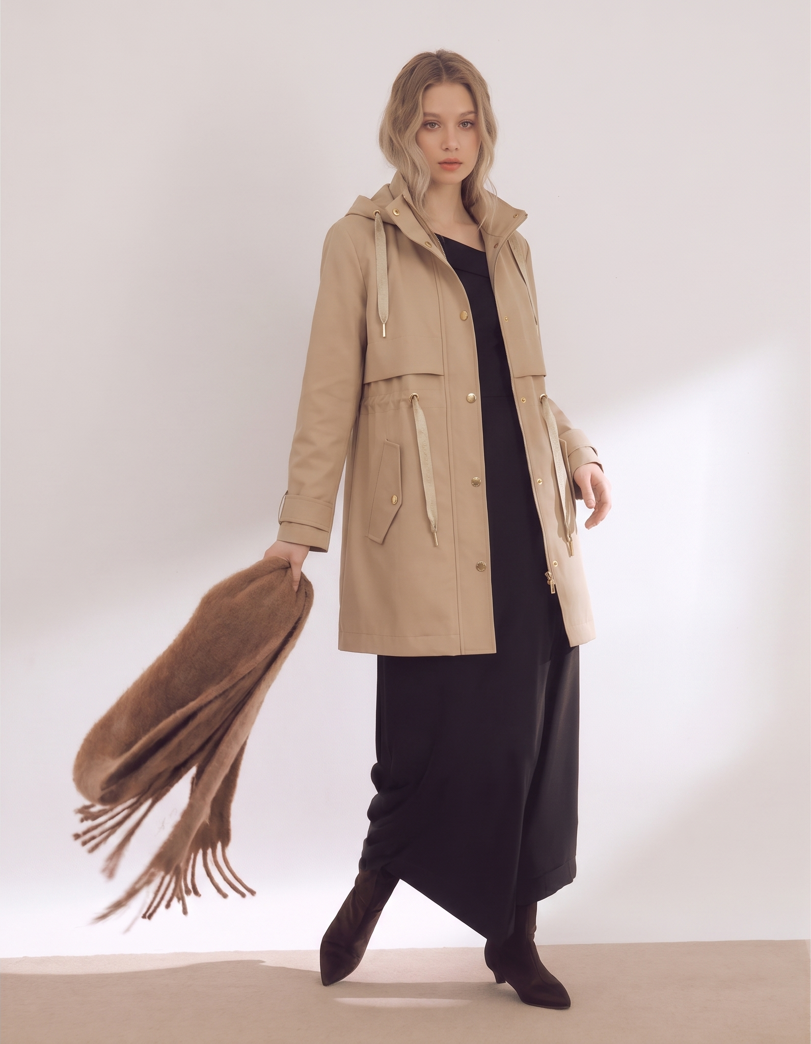 Same tan parka coat rendered on AI fashion model with scarf styling and full-body lifestyle setting — AI Fashion Model output sized for Depop / Vinted / Whatnot listings