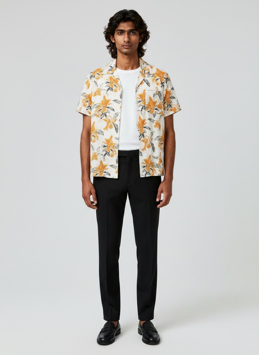 Claid AI model output — the orange lily print camp-collar shirt rendered on a generated model