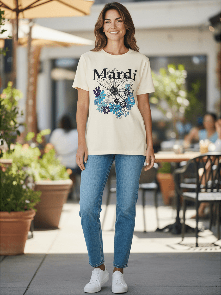 Photoroom AI model output — the cream Mardi Mercredi graphic tee rendered on a generated model