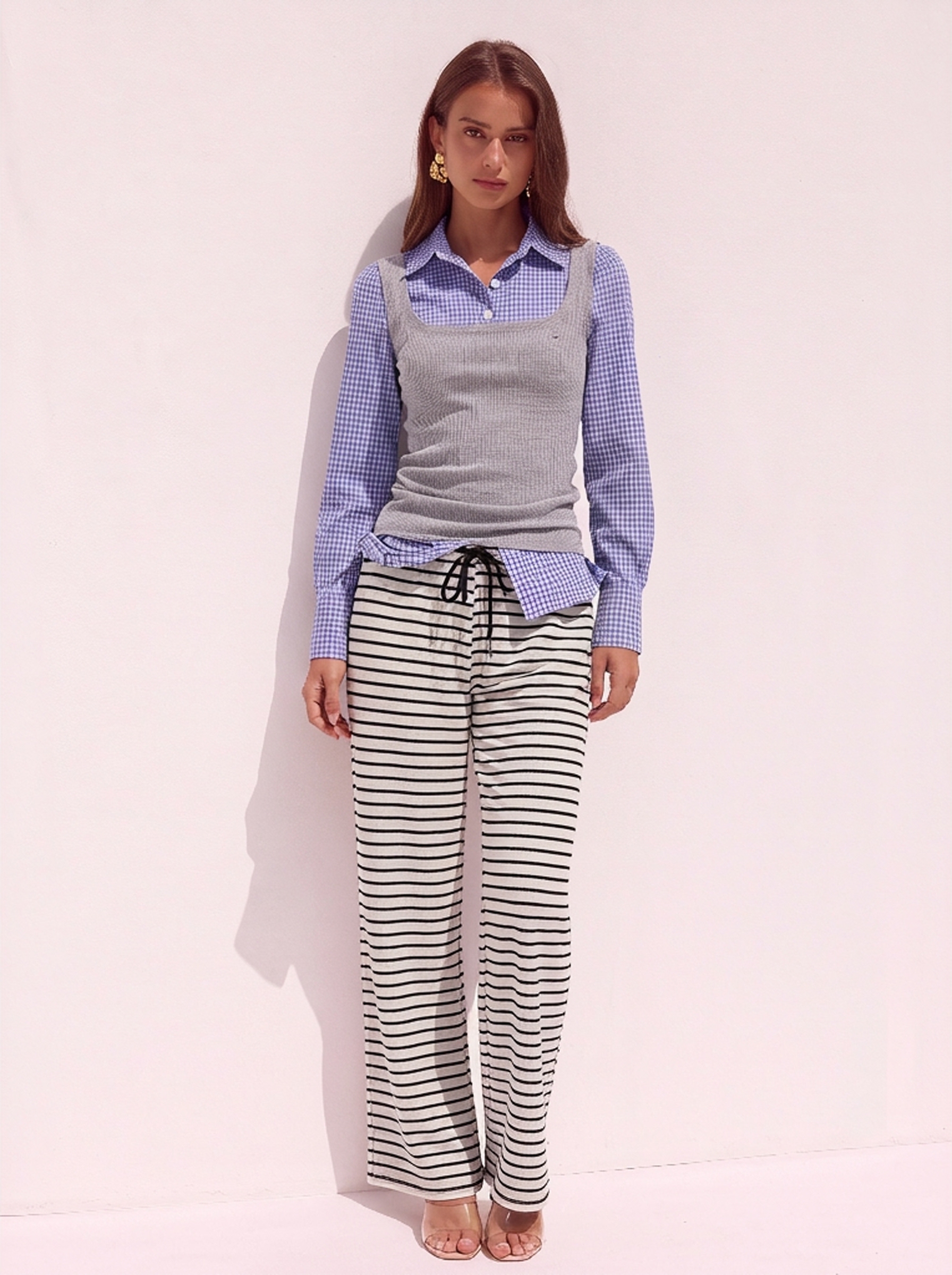 WearView AI model output — the black and white striped wide-leg pants rendered on a generated model